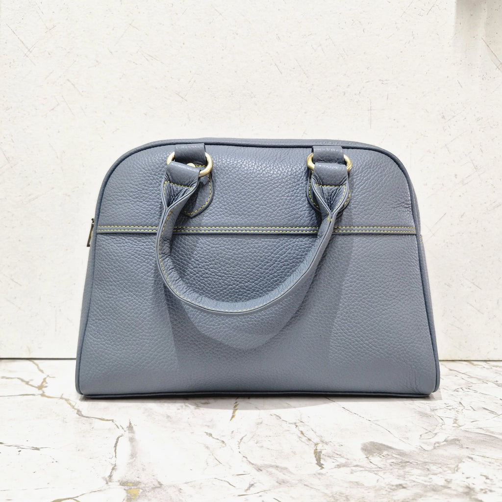 Blue pebbled genuine leather mini tote designer handbag with contrast yellow stitching and gold-tone hardware.