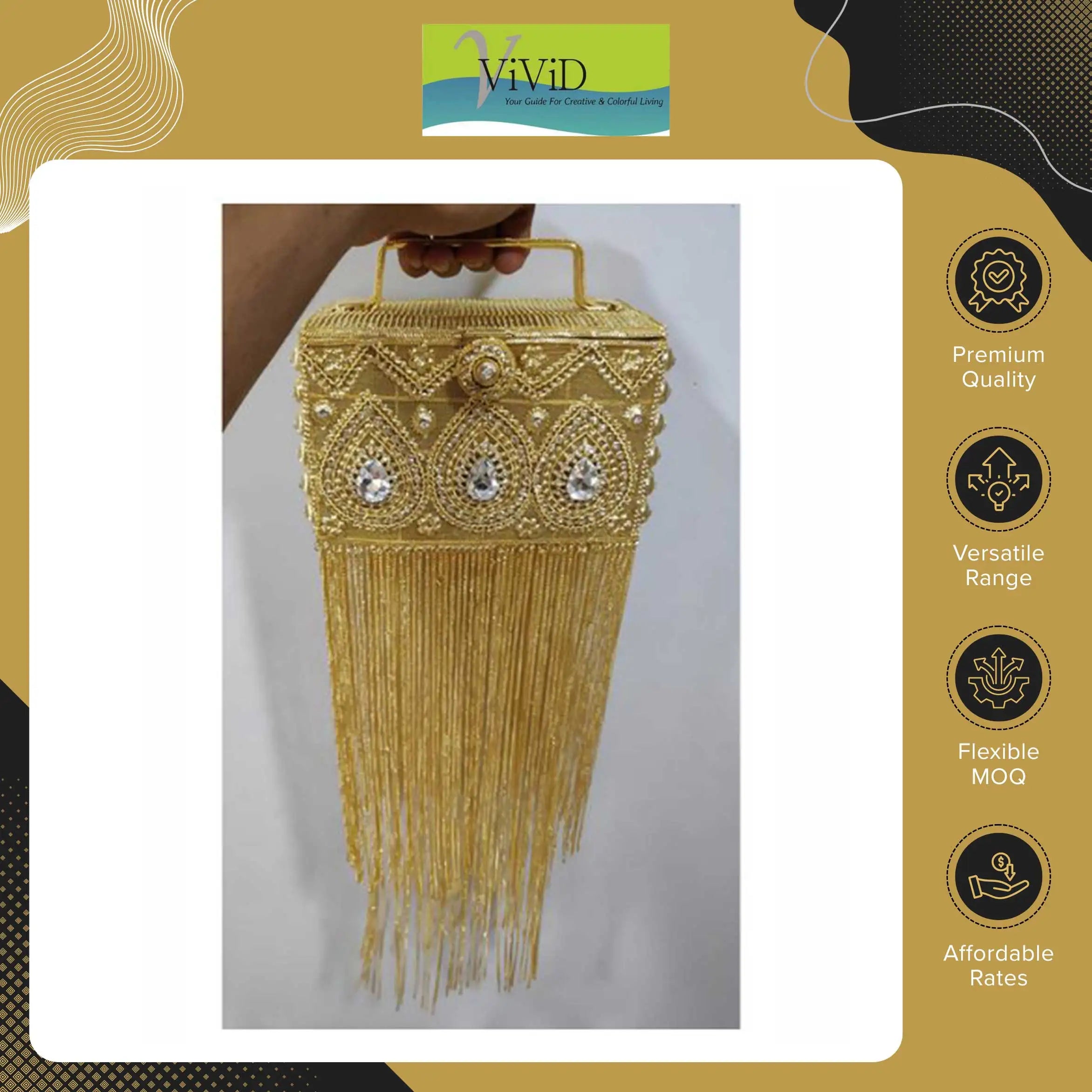 Gold designer metal clutch handbag with crystal embellishments and long fringe tassels for elegant evening wear.