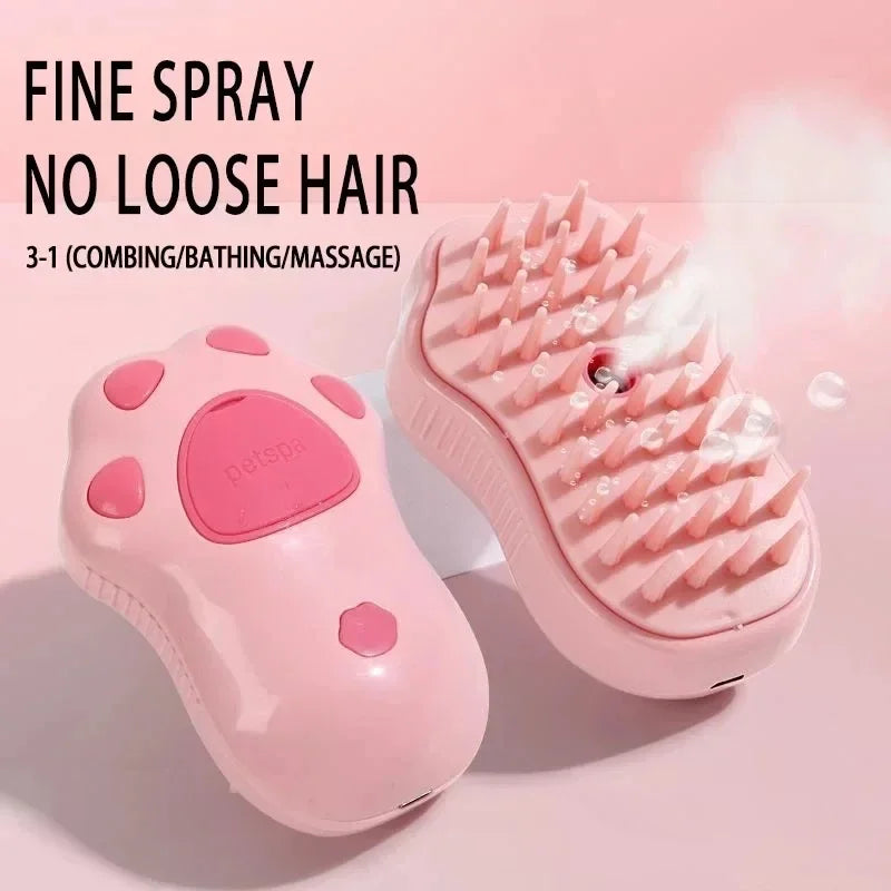 Pink 3-in-1 electric steam pet grooming brush for cats and dogs. Removes loose hair with massage and fine mist spray.