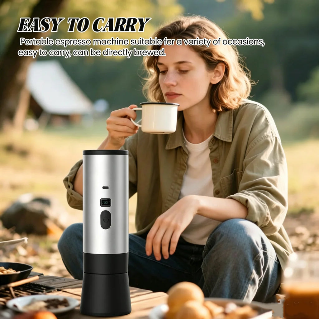 Silver and black portable electric espresso maker for camping and travel with digital display.
