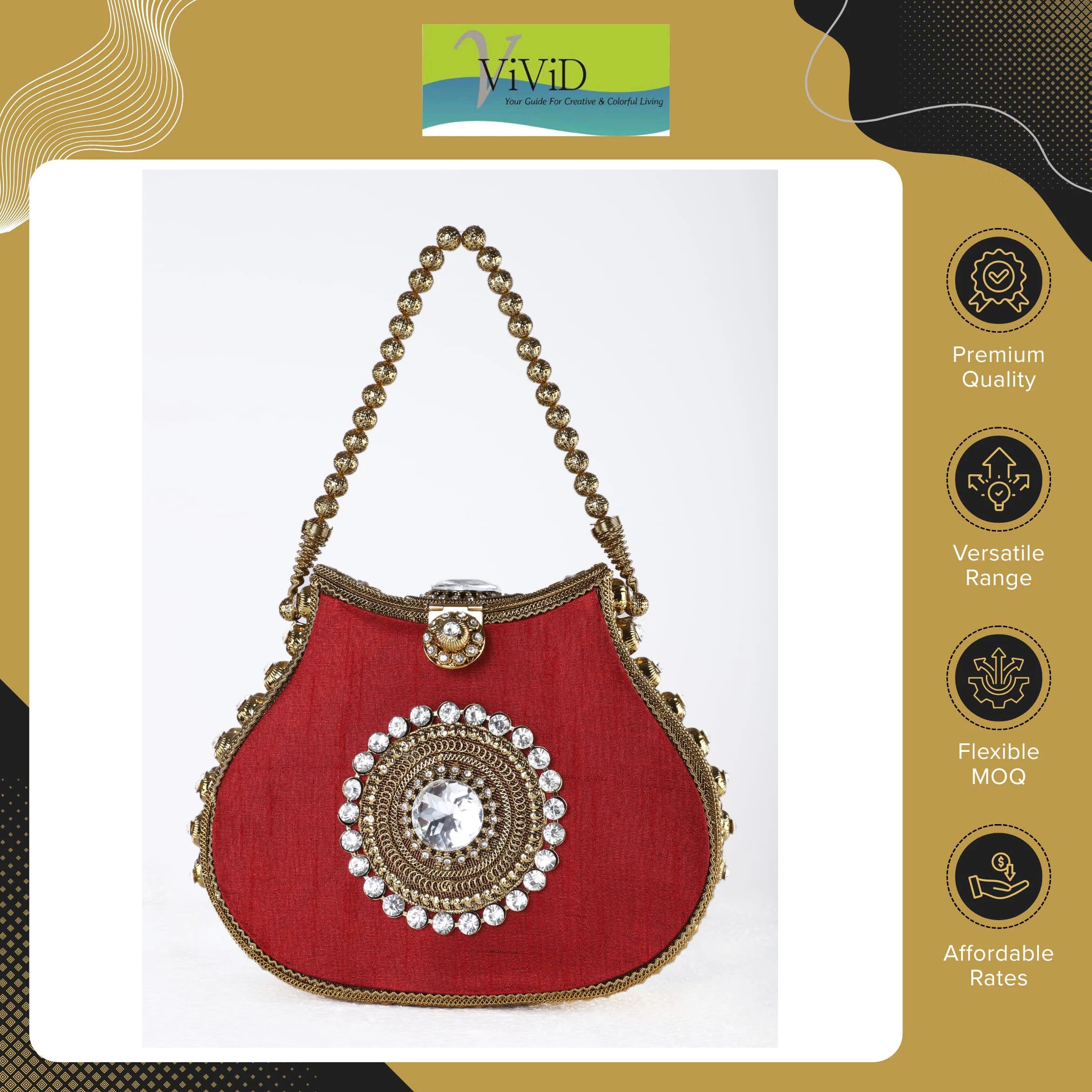 Red silk designer handbag with gold metal beading, rhinestone center, and kiss lock closure.