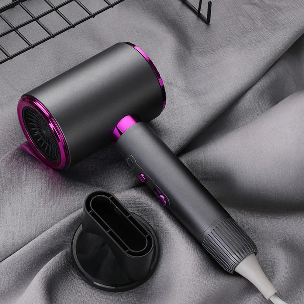 2400W high-speed black and purple ionic hair dryer with styling nozzle for quick, professional salon drying at home.