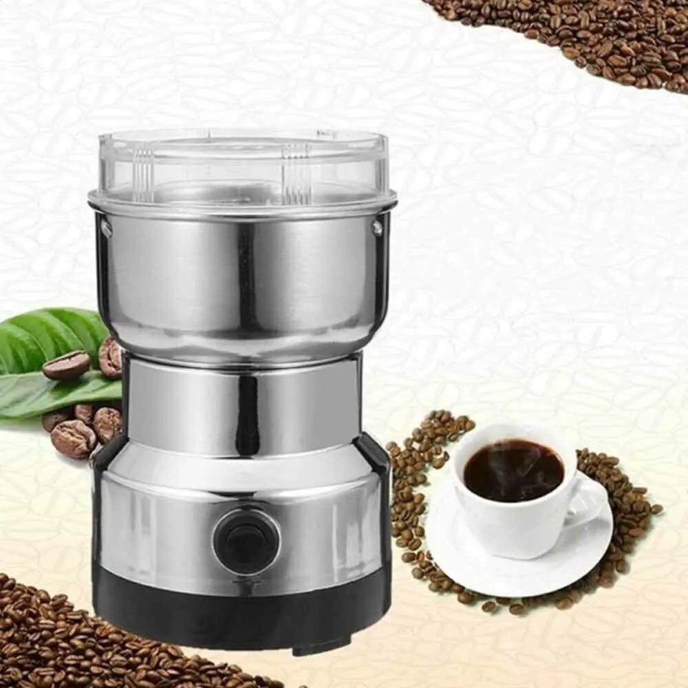Electric stainless steel coffee bean grinder with transparent lid and push-button operation on a coffee bean background.