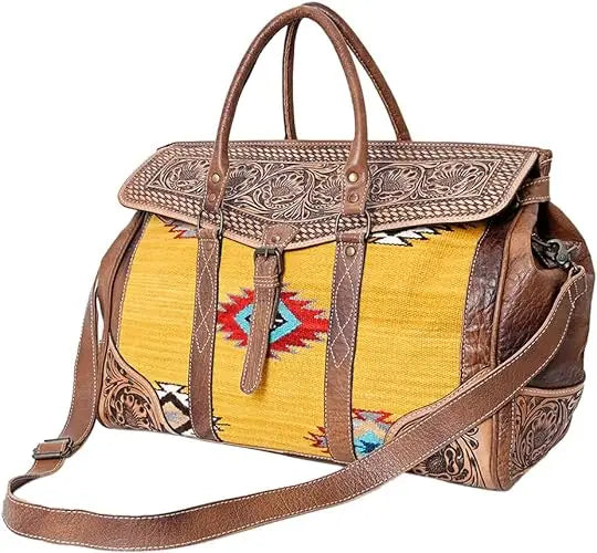Hand-tooled brown leather trunk bag with yellow Aztec saddle blanket fabric, bohemian sling style for women.