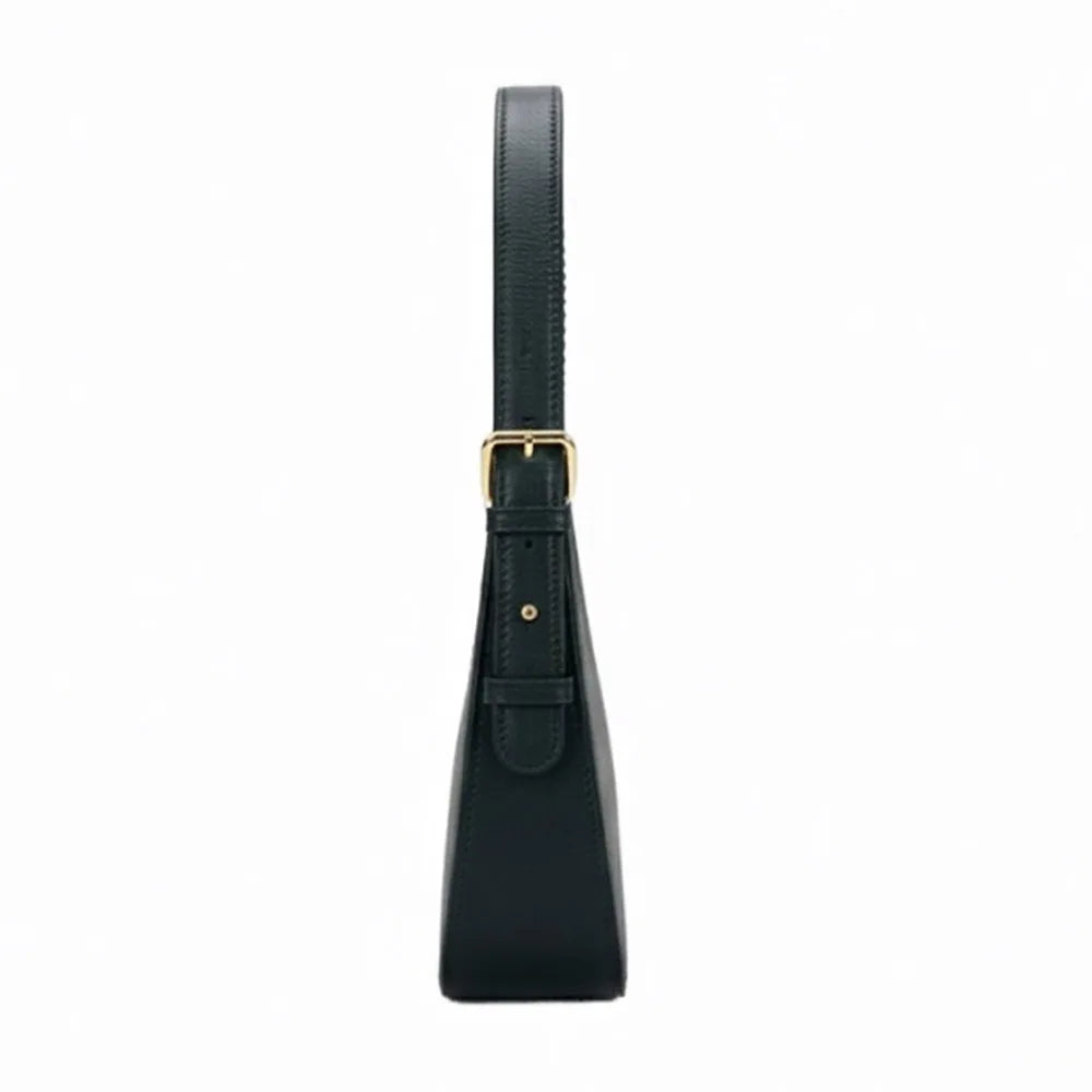 Black genuine leather designer shoulder bag with adjustable buckle strap and gold hardware, side profile view.