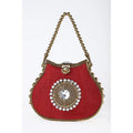Red silk designer handbag with gold beaded handle, ornate crystal center medallion, and metallic kiss lock closure.