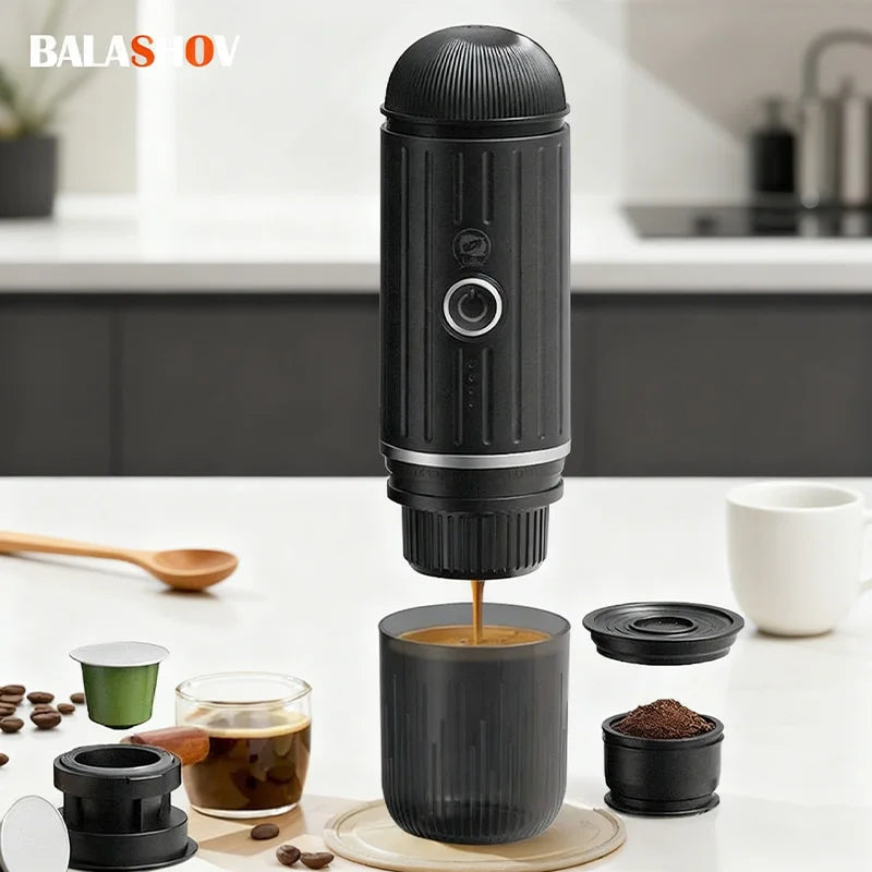Balashov black portable electric espresso maker for capsules and ground coffee, shown with cup and accessories.