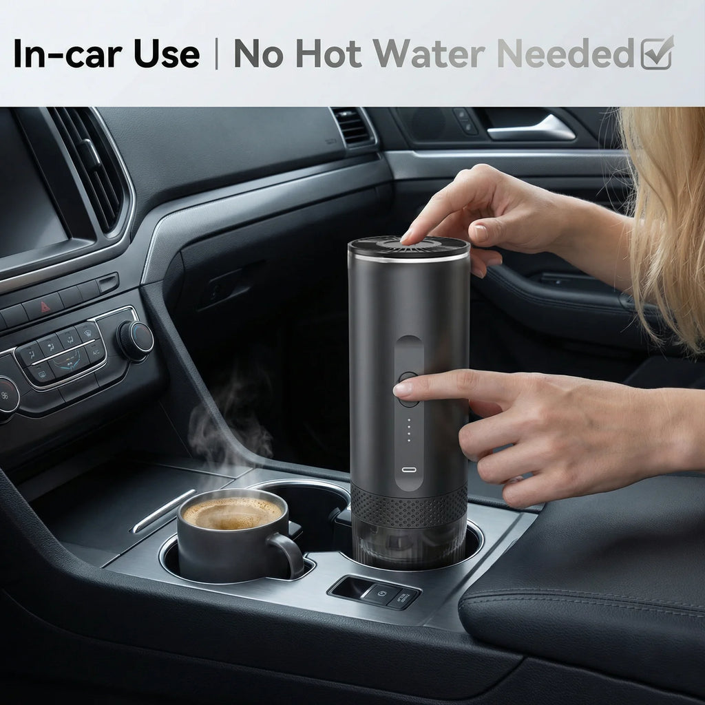Portable charcoal grey electric car coffee maker heating espresso in a cup holder inside a vehicle interior.