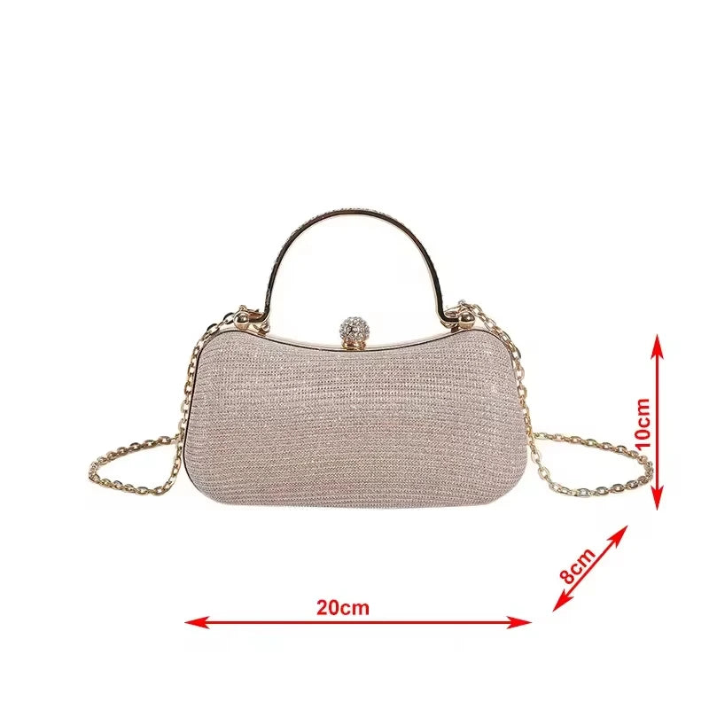 Gold shimmer PU designer evening clutch with rhinestone crystal handle and detachable chain strap for weddings.