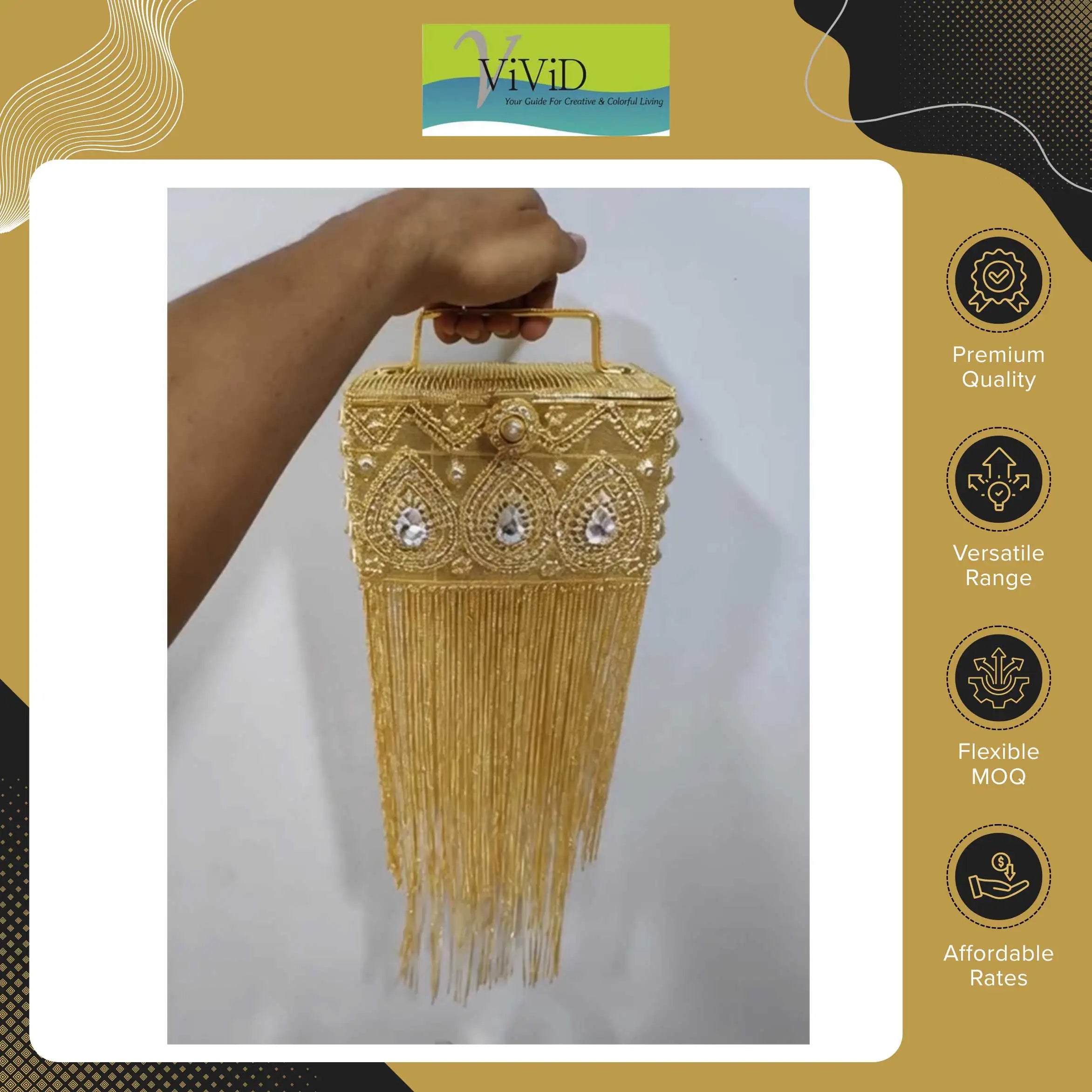 Gold metal clutch handbag with intricate beadwork, rhinestone teardrop motifs, and elegant hanging fringe detail.