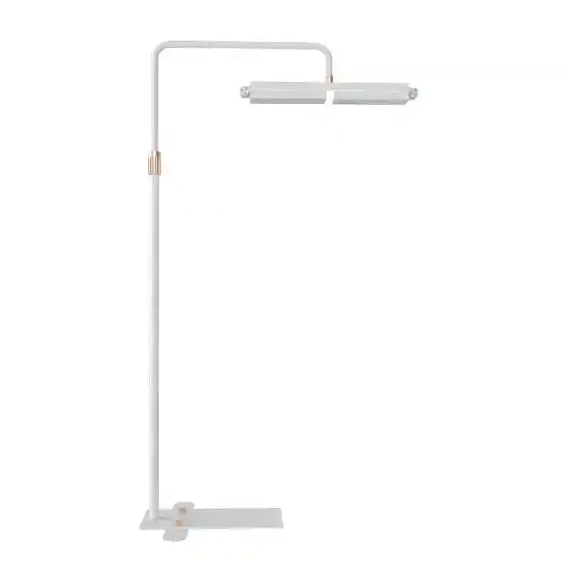 Minimalist white floor lamp with copper accents and a long, adjustable rectangular head for focused task lighting.