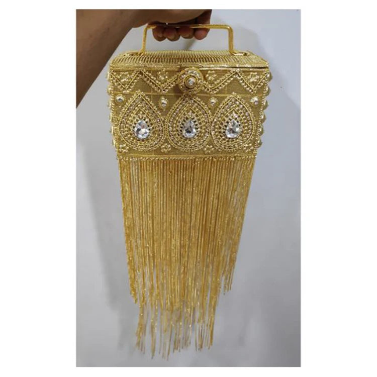 Luxury gold metal box clutch handbag with intricate beadwork, crystal teardrops, and long fringe tassel detail.