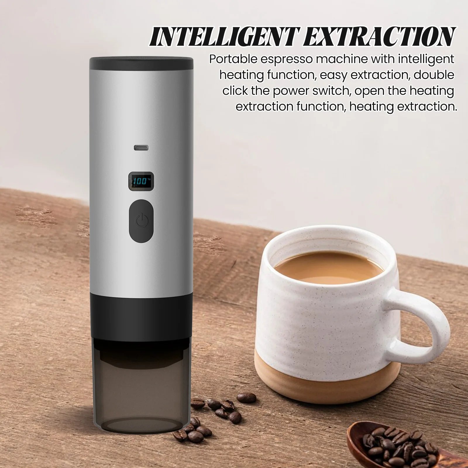 Portable silver electric espresso maker with digital display, heating function, and coffee cup on a wooden table.