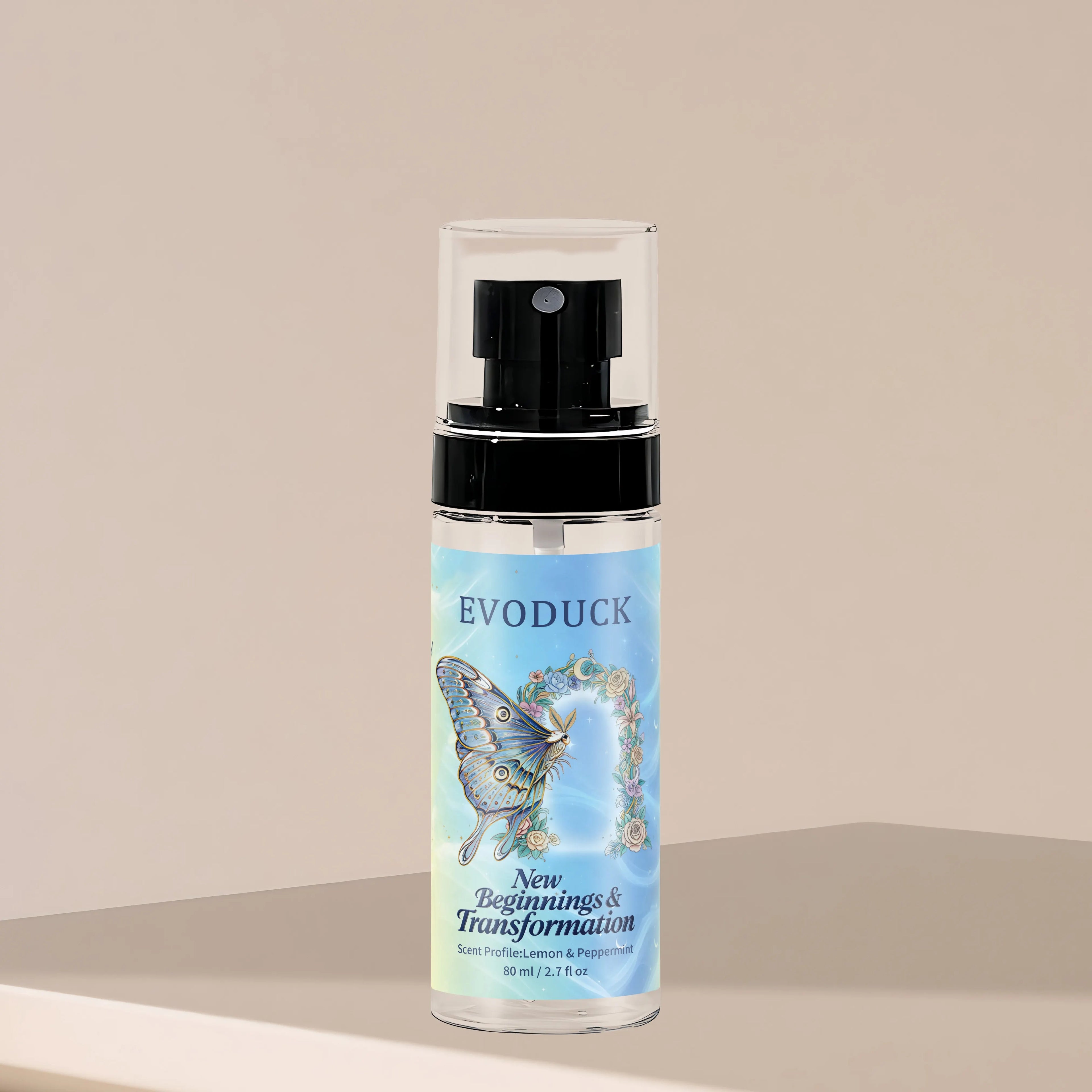 Evoduck New Beginnings & Transformation 2.7oz travel body spray for women. Lemon & Peppermint scent in a clear pump.