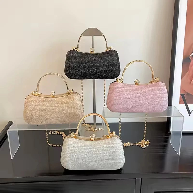 Luxury designer evening clutch handbags in black, gold, pink, and silver glitter PU with crystal handles and chain.