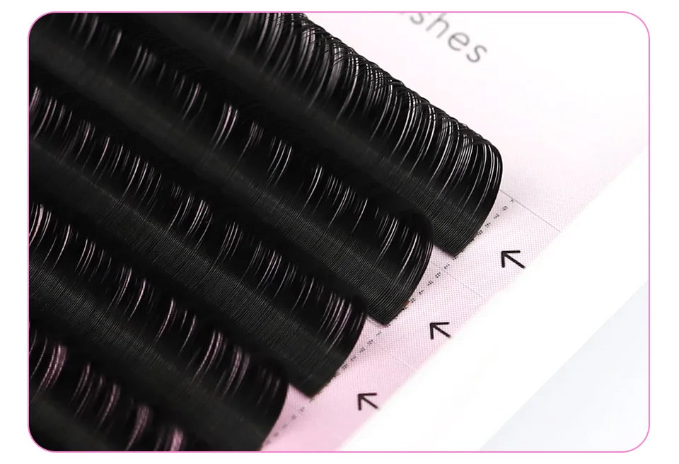 Tidesmit black Russian volume eyelash extension strips on a gridded white background.