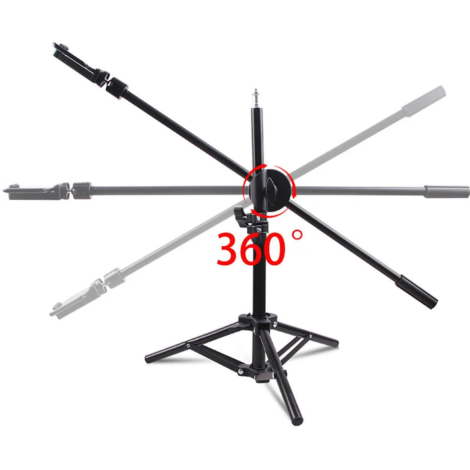 Black metal tripod stand with a 360-degree rotating boom arm and phone mount for overhead photography and filming.