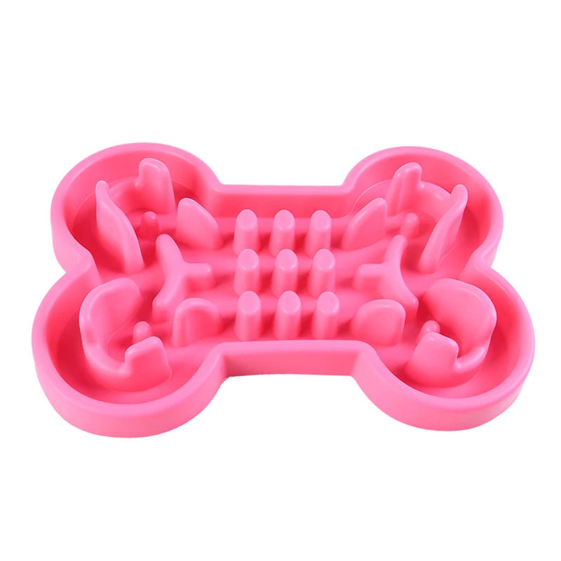 Pink bone-shaped soft rubber slow feeder bowl for dogs and cats to prevent gulping and aid healthy digestion.