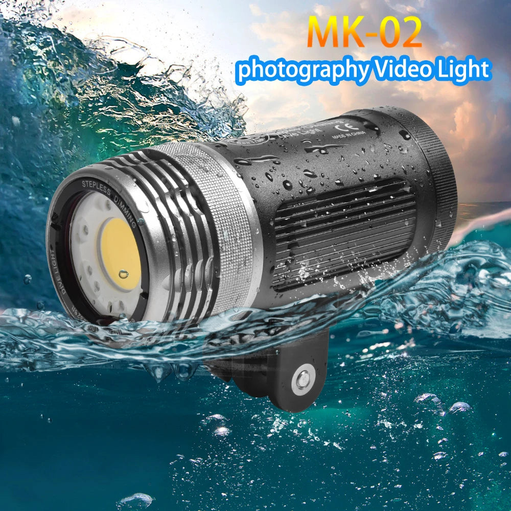 MK-02 waterproof cylindrical LED photography video light in black metal, partially submerged in ocean water.
