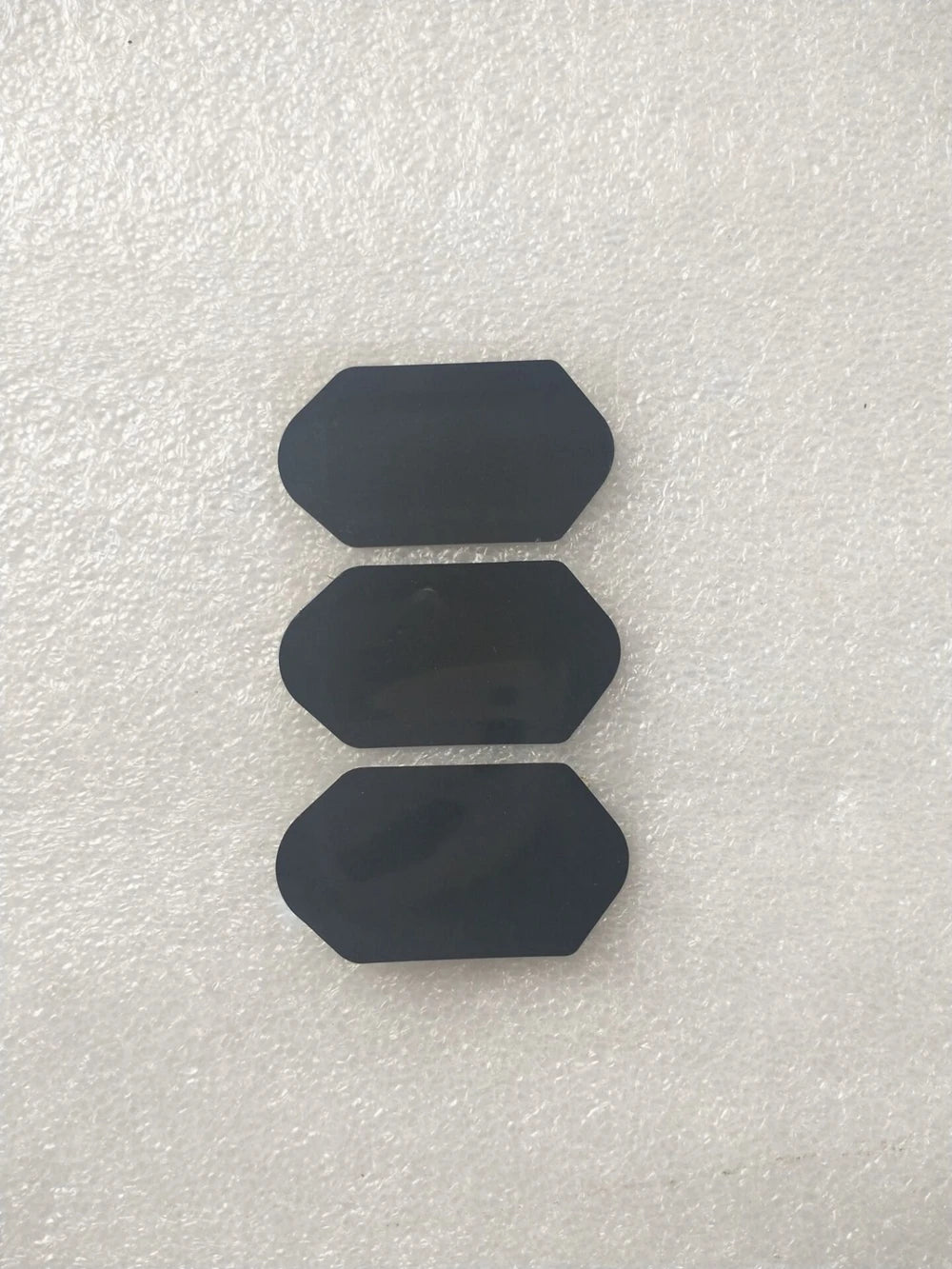 Three black replacement film stickers for 3D 4D HIFU machine cartridges, hexagon-shaped adhesive patches on white foam.