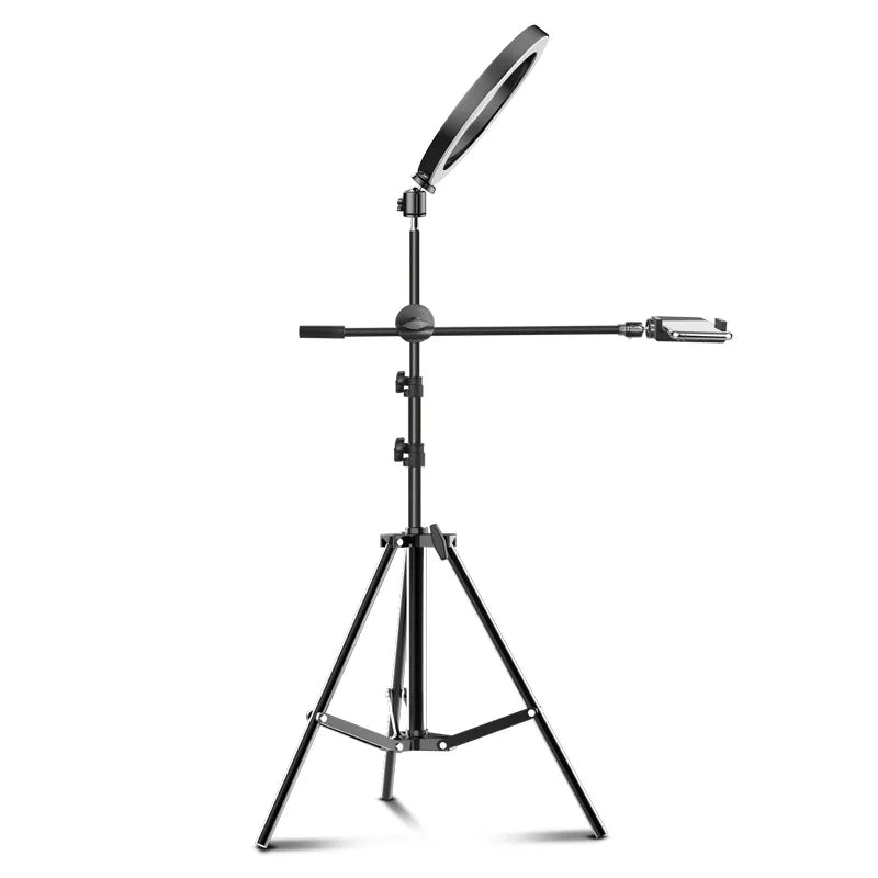 Black metal tripod stand with an adjustable ring light and side phone mount for photography and video recording.