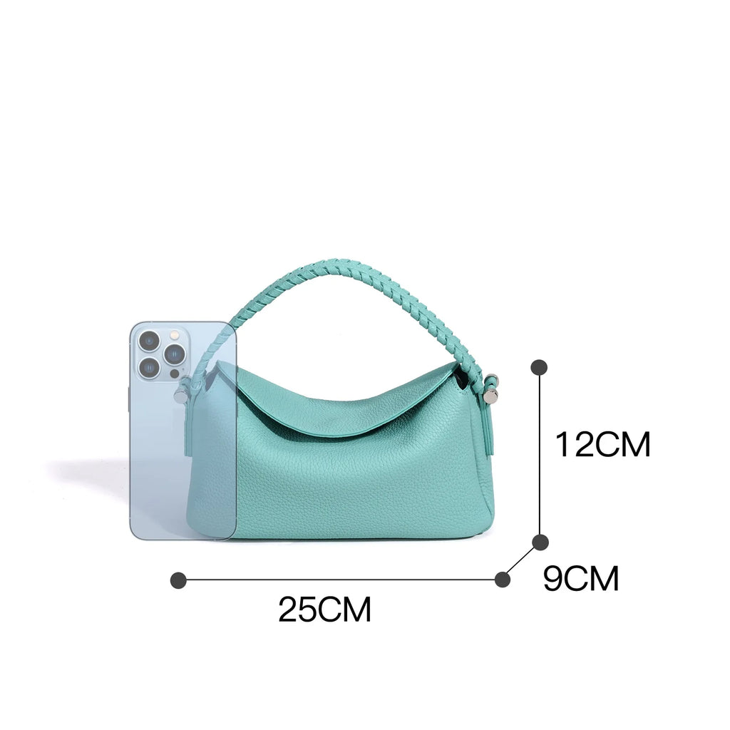 Small mint green pebble leather tote bag with braided handle, designer shoulder bag style, 25cm width.
