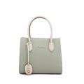Sage green Jack Captain genuine leather designer tote bag with cream top handles and logo charm.