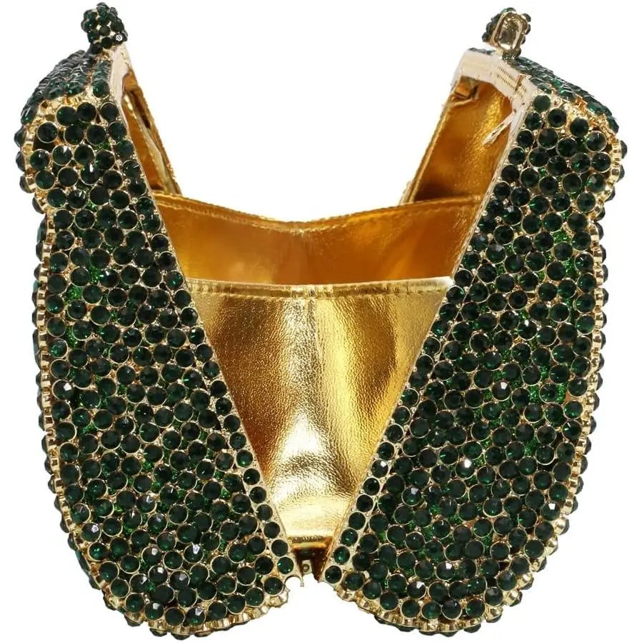 Green crystal evening clutch with metallic gold interior, structured diamond-style frame, and glamorous wedding design.
