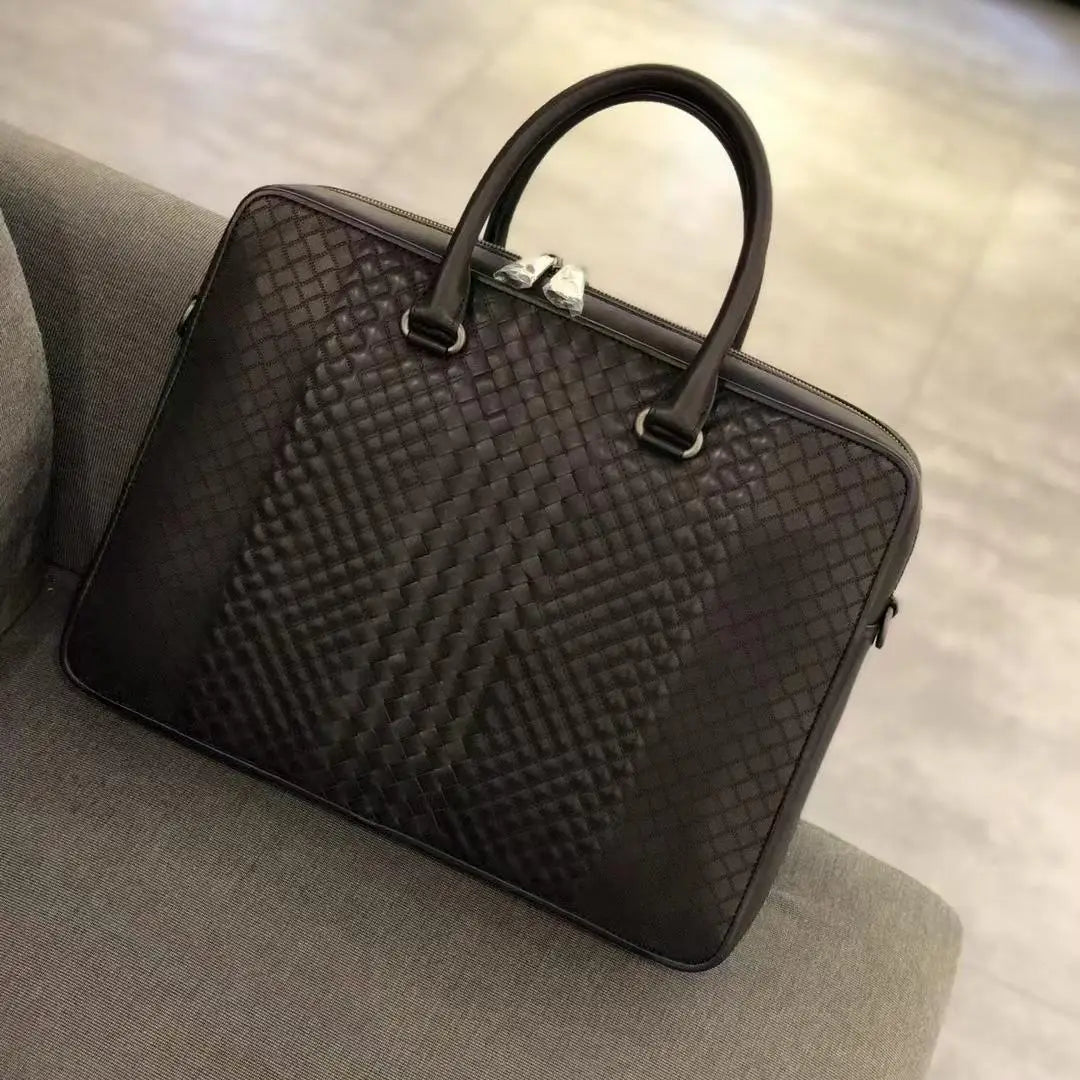 Luxury dark brown woven leather men's 13-inch slim briefcase in waxed calfskin for business office use.
