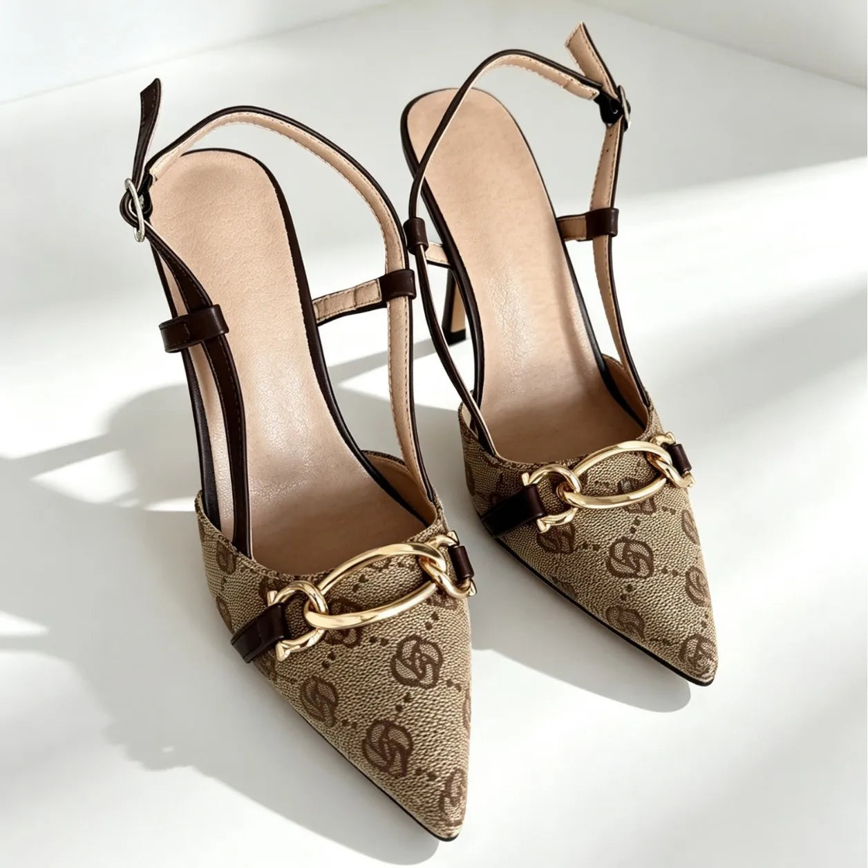 This Fashionable Sandal Features a  Rhinestone Bow Design. It Has a Unique, Slender Heel Style and Is Versatile