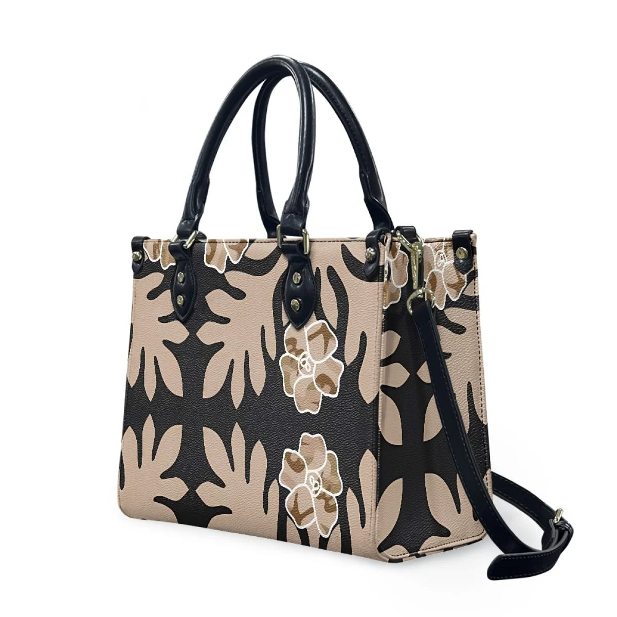 Luxury leather handbag featuring black and beige Polynesian tribal floral print with black handles and shoulder strap.