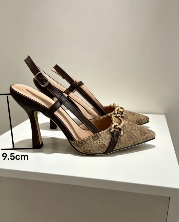 This Fashionable Sandal Features a  Rhinestone Bow Design. It Has a Unique, Slender Heel Style and Is Versatile