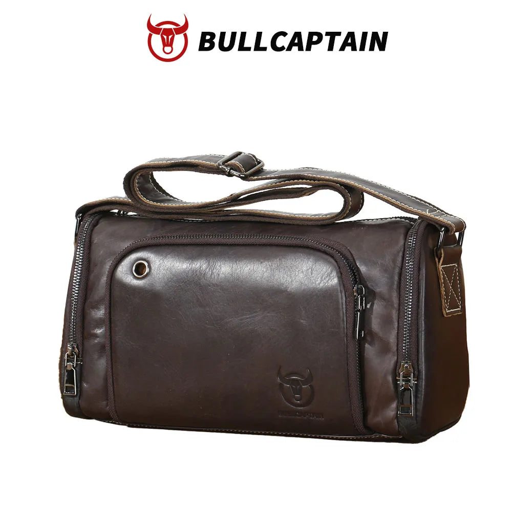BULLCAPTAIN dark brown cowhide leather trunk-style messenger bag with adjustable strap, front zip pocket, and logo.