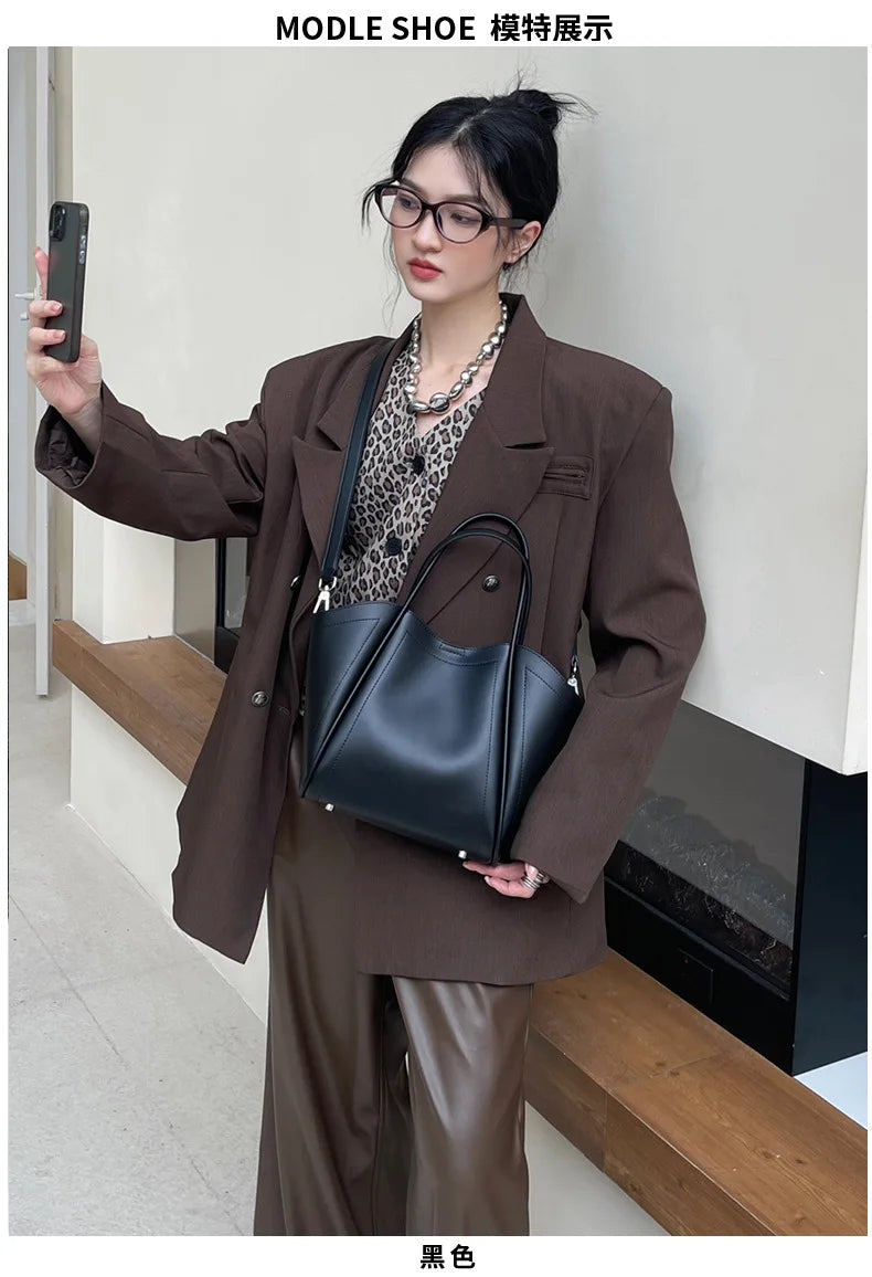 2025 Autumn Winter High-End Niche Genuine Leather Wing Bag Large Capacity Commuter Shoulder Promotional Drawstring Sportpacks