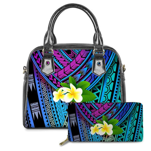 Vintage PU leather handbag and wallet set with vibrant blue and purple Polynesian tribal print and plumeria flowers.