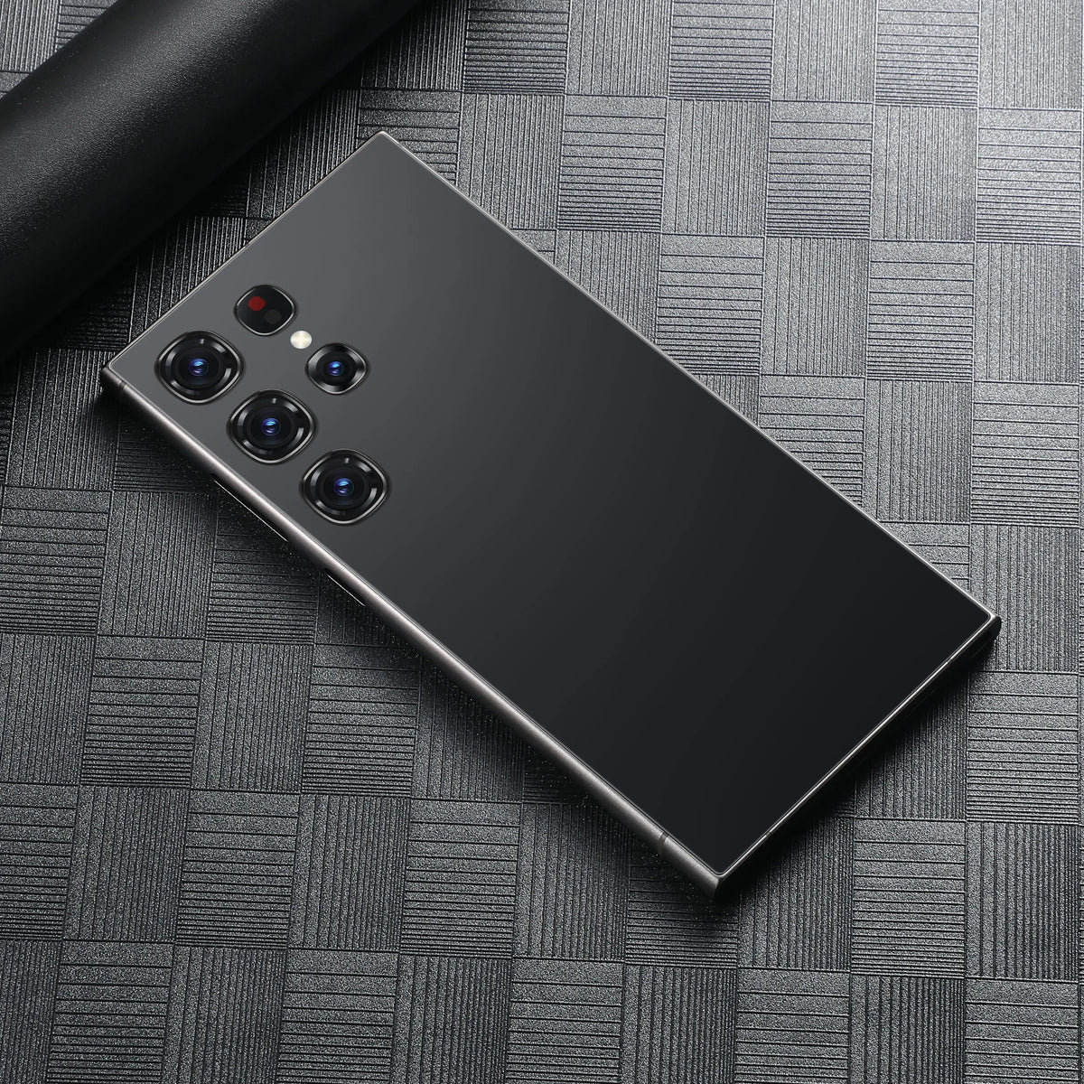 Black smartphone with quad rear cameras and slim metal frame