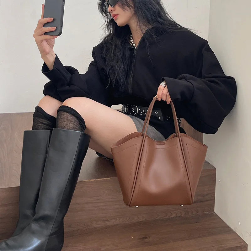 2025 Autumn Winter High-End Niche Genuine Leather Wing Bag Large Capacity Commuter Shoulder Promotional Drawstring Sportpacks