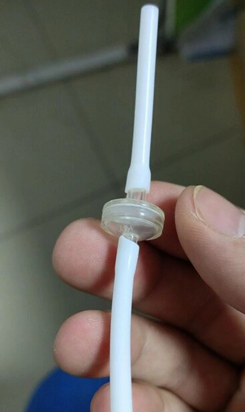 Disposable white connection tube for Microneedle RF skin lifting machine with integrated clear plastic filter.