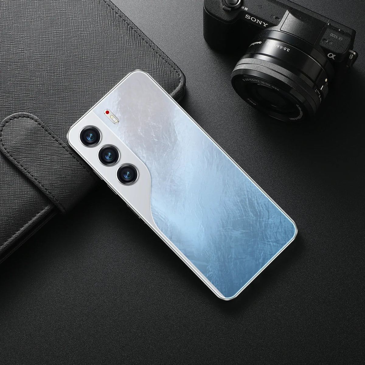 Light blue smartphone back with triple camera module on dark case