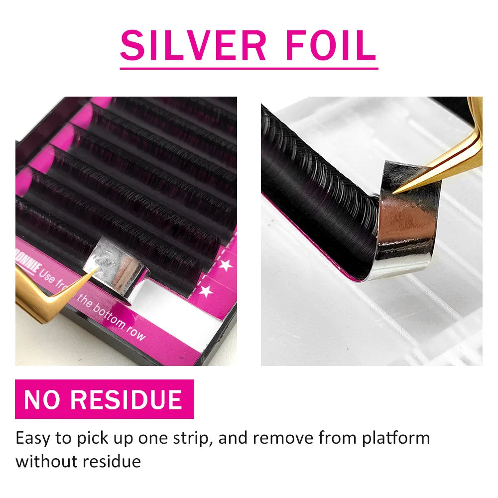 Black lash extensions on a silver foil backing strip for residue-free removal from the tray.