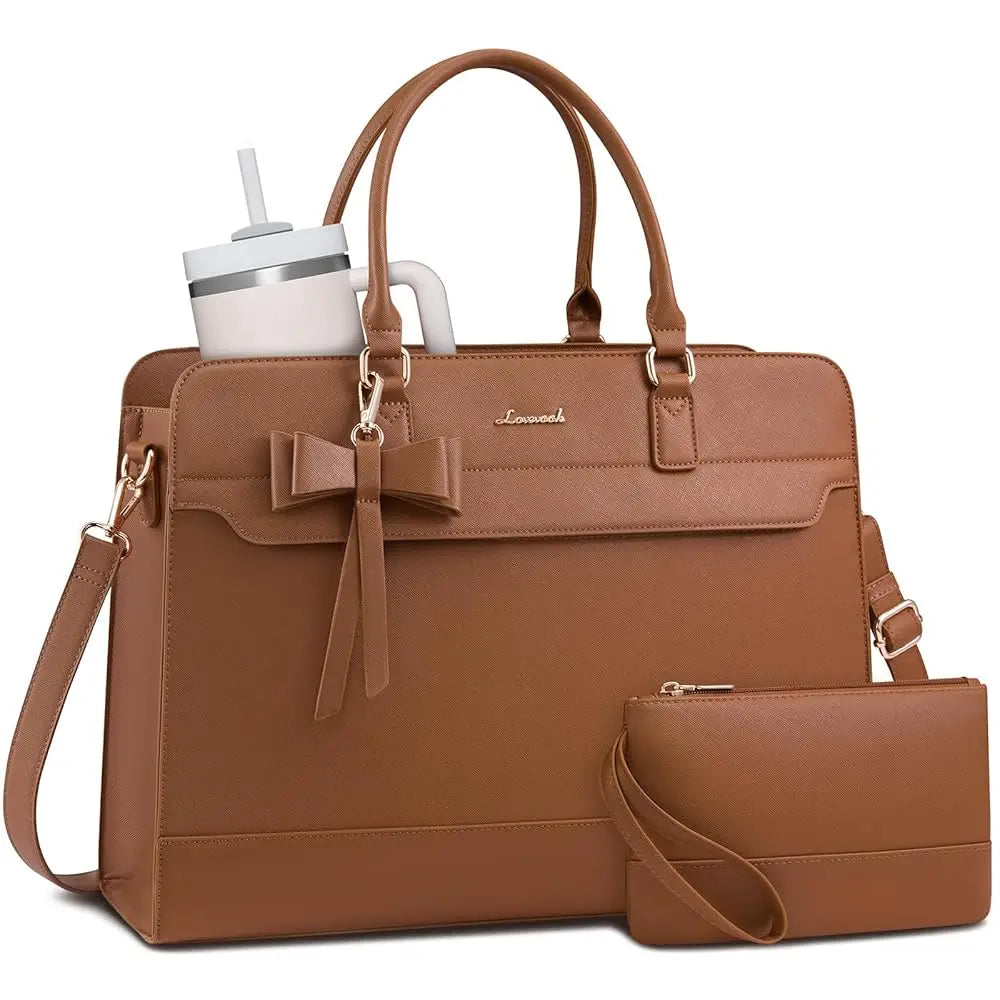 Brown leather 15.6-inch laptop tote bag with bow detail, matching wristlet, and shoulder strap. Designer work handbag.