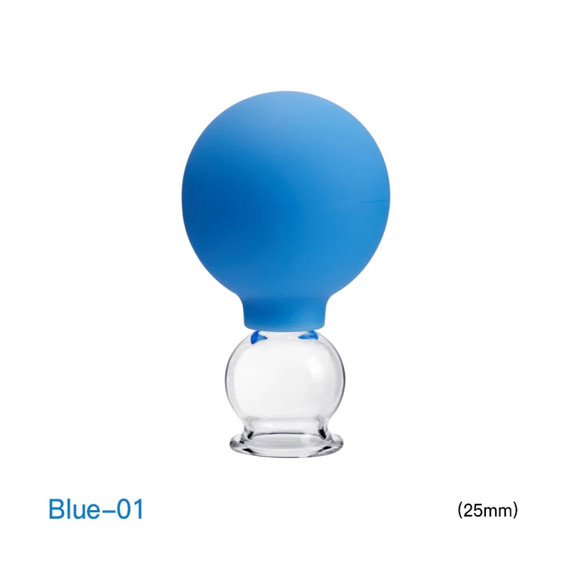 Blue silicone vacuum cupping massager with a clear glass cup, 25mm size, used for facial or body therapy.