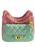 Pink and green quilted designer crossbody handbag with gold chain strap, metal charm, and twist-lock closure.