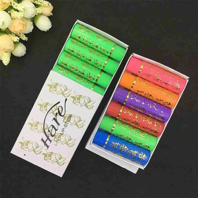 6-pack magic color-changing lipsticks in butterfly-patterned tubes, long-lasting lip makeup in assorted vibrant colors.