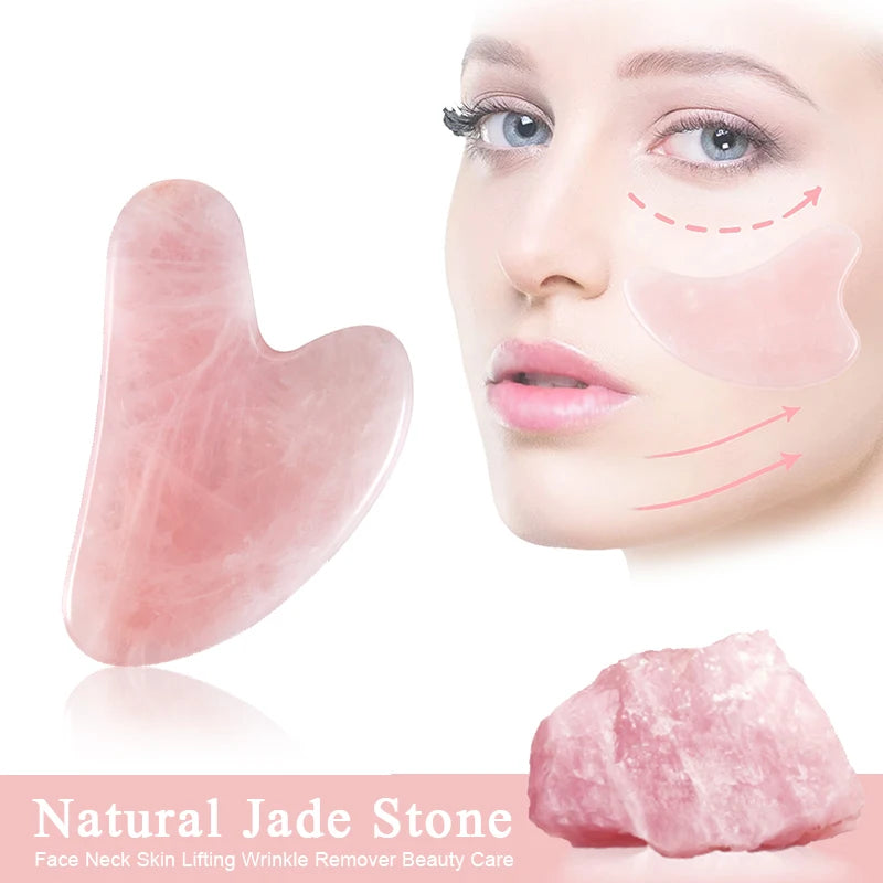 A heart-shaped pink rose quartz Gua Sha stone next to a woman’s face and a raw piece of rose quartz.