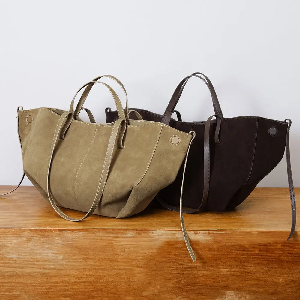 Olive and dark brown genuine suede leather designer handbags with double top handles and side snap button detailing.