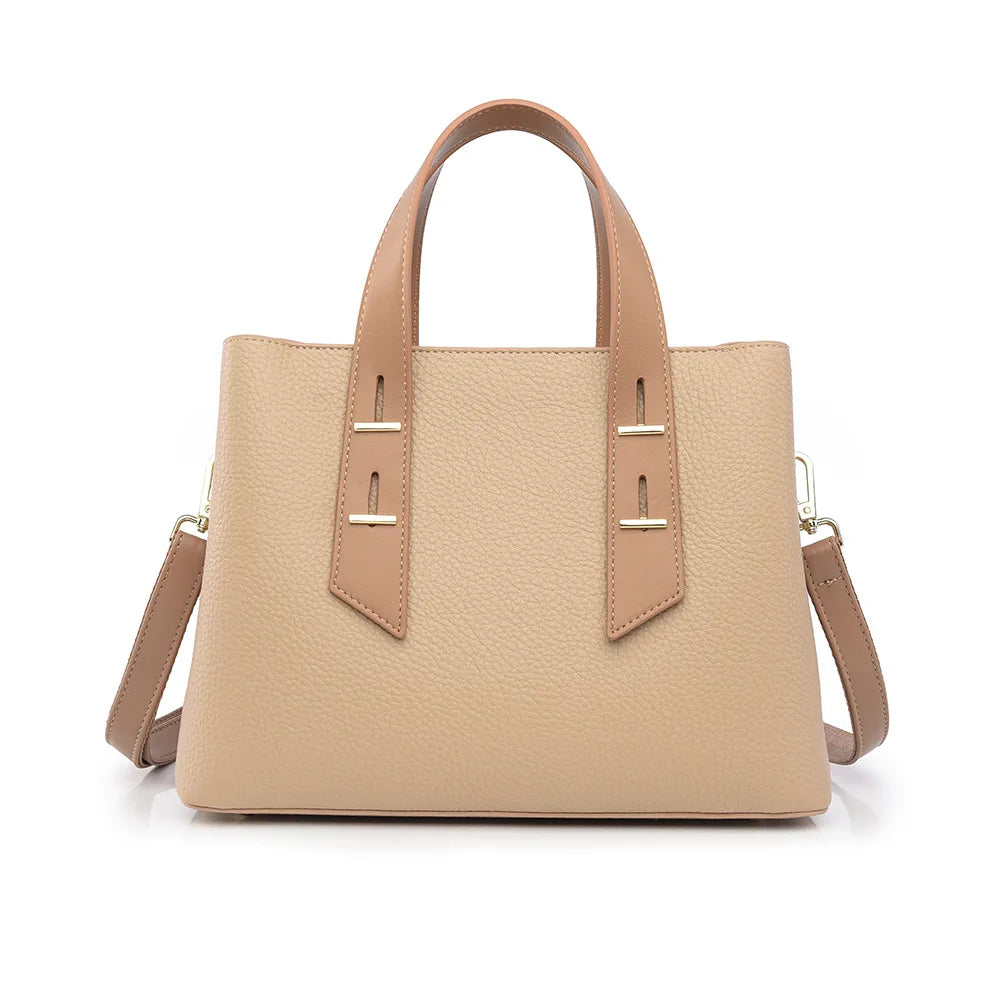 Beige pebbled leather designer handbag with dual top handles, gold hardware, and detachable shoulder strap.