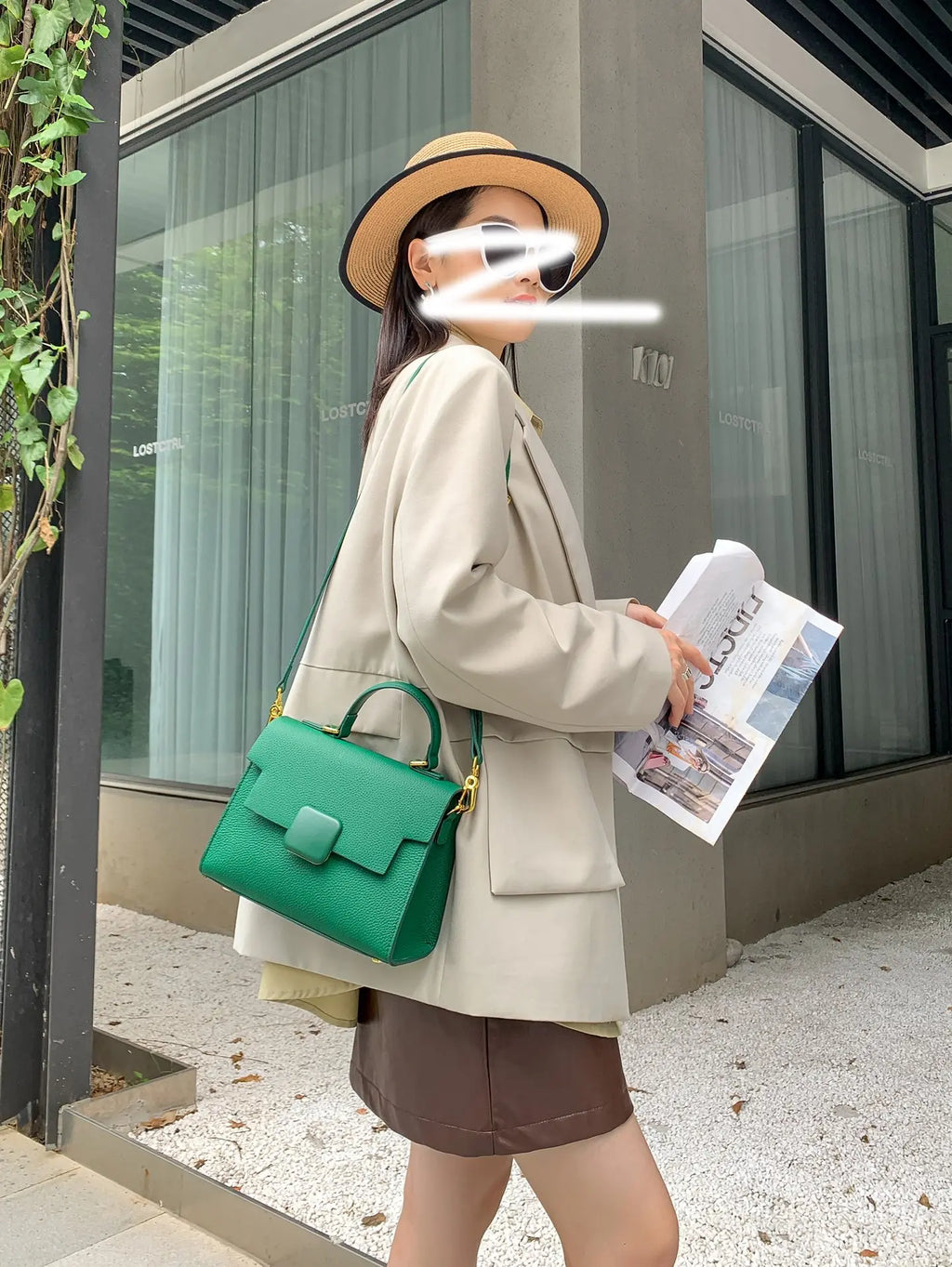 Green genuine leather designer handbag, structured shoulder tote with top handle and magnetic flap closure.