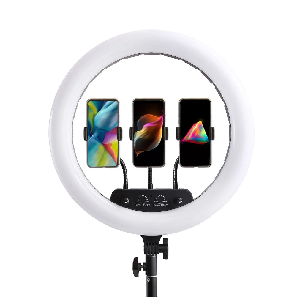 Large white circular ring light on a stand with three flexible phone mounts for content creation and photography.
