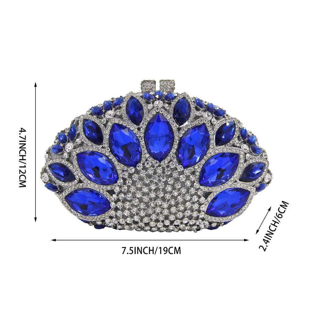 Blue crystal evening clutch, designer handbag featuring large blue rhinestones and silver pave accents, oval shape.